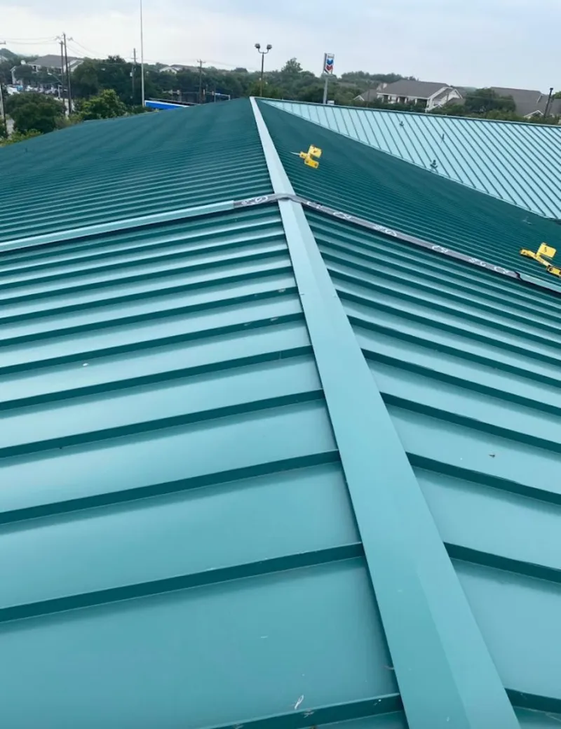 Green commercial metal roof ridge and valley for Metal Roof Repair in Roxboro
