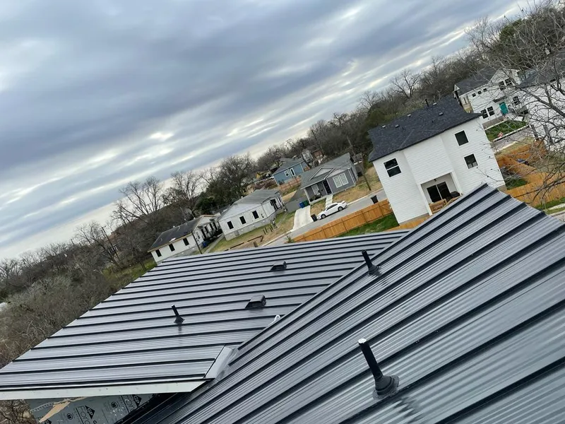 Standing seam metal roof panels with vents for Skylight Repair in Roxboro